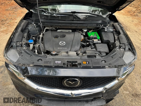 2020 Mazda CX-5 Grand Touring with VIN JM3KFADM8L0785373, listed as a Copart auction lot 50829175 with 135,736 mi miles and Clean Title. Bid and sale history available at DreamBid. Image 7.