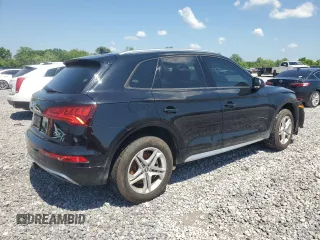 2018 Audi Q5 Premium with VIN WA1ANAFY0J2040684, listed as a Copart auction lot 54777815 with 77,504 mi miles and Salvage title. Bid and sale history available at DreamBid. Image 3.