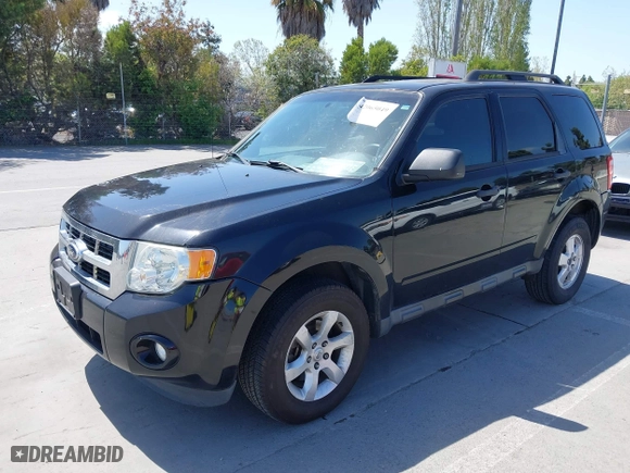 2012 Ford Escape XLT with VIN 1FMCU0D71CKC10734, listed as a IAAI auction lot 42065049 with 207,698 mi miles. Bid and sale history available at carsss.com. Image 2.