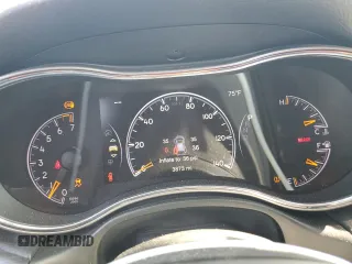 2021 Jeep Grand Cherokee Laredo E with VIN 1C4RJEAGXMC719497, listed as a Copart auction lot 60830315 with 3,873 mi miles and Salvage title. Bid and sale history available at DreamBid. Image 9.
