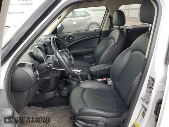2013 MINI Countryman S ALL4 with VIN WMWZC5C51DWP34357, listed as a Copart auction lot 54945905 with 125,355 mi miles and Salvage title. Bid and sale history available at DreamBid. Image 7.