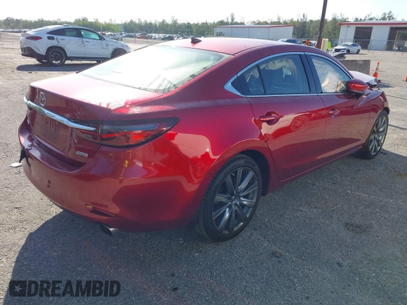 2018 Mazda 6 Grand Touring with VIN JM1GL1TY1J1302146, listed as a IAAI auction lot 41788881 with 55,852 mi miles and . Bid and sale history available at DreamBid. Image 4.