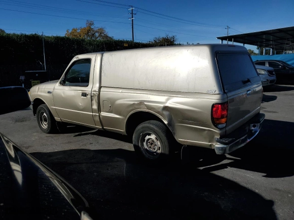 1999 Mazda B-Series 2WD Truck SX with VIN 4F4YR12C1XTM39102, listed as a Copart auction lot 83462634 with 241,380 mi miles and Salvage Title. Bid and sale history available at carsss.com. Image 2.