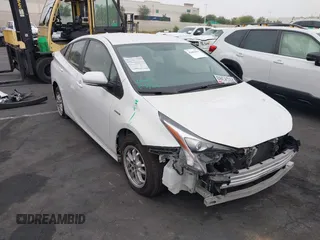 2016 Toyota Prius Two z VIN JTDKBRFU0G3003930, wystawiony jako IAAI lot #42481919 z przebiegiem 58 870 mil mil oraz . Historia ofert i sprzedaży dostępna na DreamBid. Obrazek 1.