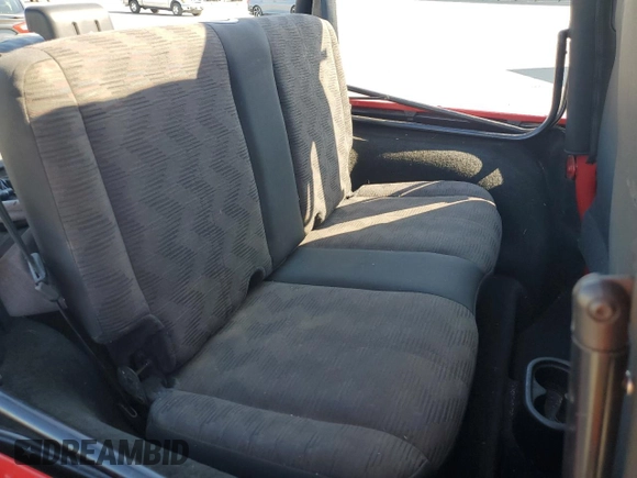 2003 Jeep Wrangler Sport z VIN 1J4FA49S33P302780, wystawiony jako Copart lot #60354805 z przebiegiem 201 679 mil mil oraz Szkoda całkowita • Salvage title. Historia ofert i sprzedaży dostępna na DreamBid. Obrazek 10.