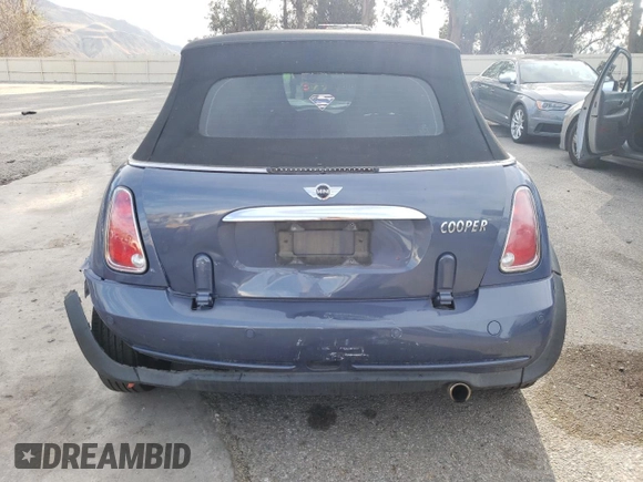 2007 MINI Convertible with VIN WMWRF33537TF66807, listed as a Copart auction lot 43664845 with 91,079 mi miles and Salvage Title. Bid and sale history available at DreamBid. Image 6.