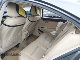 2013 Lexus ES 300h with VIN JTHBW1GG5D2017997, listed as a IAAI auction lot 42185265 with 166,383 mi miles and . Bid and sale history available at DreamBid. Image 8.