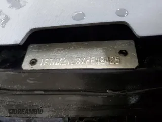 1999 Ford F-250 XL z VIN 1FTNX21L8XEE48425, wystawiony jako Copart lot #85552704 z przebiegiem 143 929 mil mil oraz Szkoda całkowita • Salvage title. Historia ofert i sprzedaży dostępna na DreamBid. Obrazek 12.