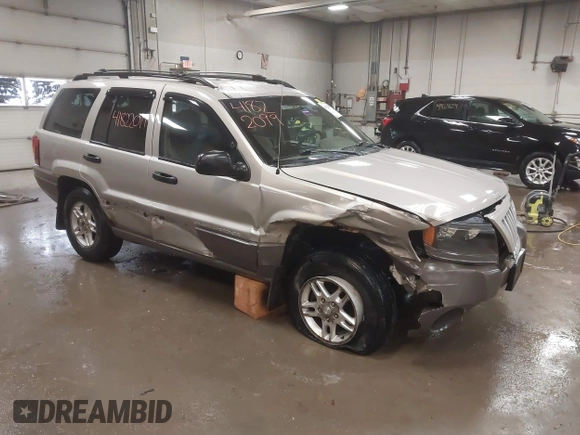 2004 Jeep Grand Cherokee Laredo with VIN 1J4GW48S44C321869, listed as a IAAI auction lot 41822099 with 181,663 mi miles. Bid and sale history available at carsss.com. Image 1.