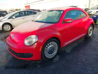 2014 Volkswagen Beetle 2.5L w/Sun with VIN 3VWJP7AT8EM629573, listed as a IAAI auction lot 41479054 with 73,950 mi miles and . Bid and sale history available at DreamBid. Image 17.