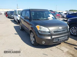 2011 Kia Soul + with VIN KNDJT2A28B7292286, listed as a IAAI auction lot 41999479 with 100,693 mi miles. Bid and sale history available at carsss.com. Image 1.