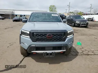 2023 Nissan Frontier Pro-4X with VIN 1N6ED1EK4PN672714, listed as a Copart auction lot 55557855 with 4,678 mi miles and Salvage title. Bid and sale history available at DreamBid. Image 5.