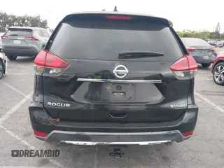 2017 Nissan Rogue S z VIN KNMAT2MV6HP542218, wystawiony jako IAAI lot #42282851 z przebiegiem 163 602 mil mil oraz . Historia ofert i sprzedaży dostępna na DreamBid. Obrazek 16.