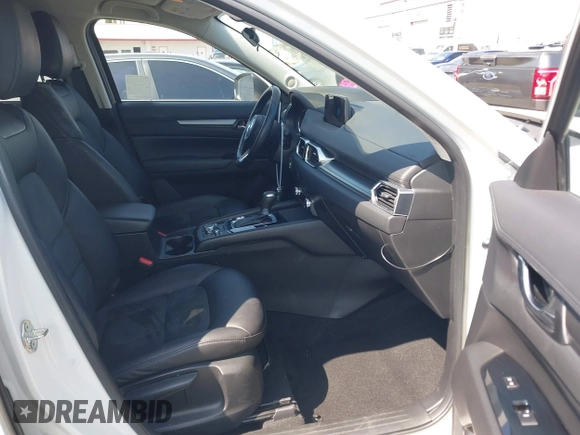 2018 Mazda CX-5 Touring with VIN JM3KFACM0J0416716, listed as a IAAI auction lot 42150121 with 61,332 mi miles and . Bid and sale history available at carsss.com. Image 5.