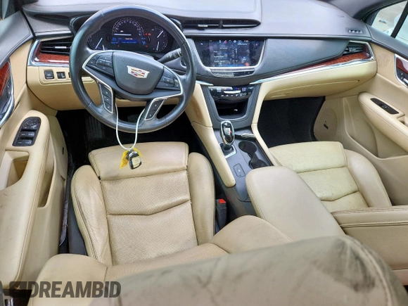 2017 Cadillac XT5 Luxury FWD z VIN 1GYKNBRSXHZ141251, wystawiony jako Copart lot #63387705 z przebiegiem 226 730 mil mil oraz Szkoda całkowita • Salvage title. Historia ofert i sprzedaży dostępna na DreamBid. Obrazek 8.