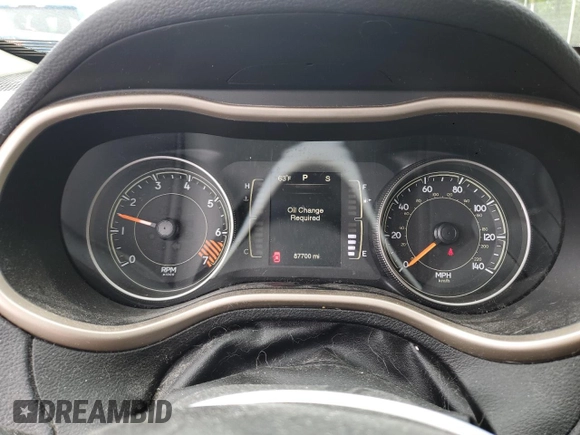 2015 Jeep Cherokee Sport z VIN 1C4PJMAB7FW660058, wystawiony jako Copart lot #56705715 z przebiegiem 87 700 mil mil oraz Szkoda całkowita • Salvage title. Historia ofert i sprzedaży dostępna na DreamBid. Obrazek 9.