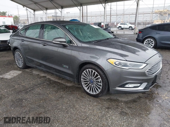 2017 Ford Fusion Titanium with VIN 3FA6P0SU8HR329570, listed as a IAAI auction lot 41773023 with 112,022 mi miles and . Bid and sale history available at DreamBid. Image 1.