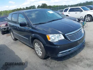 2016 Chrysler Town & Country Touring with VIN 2C4RC1BG8GR297243, listed as a IAAI auction lot 42143705 with 140,728 mi miles. Bid and sale history available at carsss.com. Image 1.