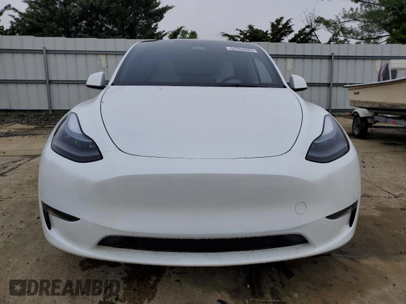 2024 Tesla Model Y Long Range with VIN 7SAYGDEE2RA329081, listed as a Copart auction lot 57254265 with 2,325 mi miles and Salvage title. Bid and sale history available at DreamBid. Image 5.
