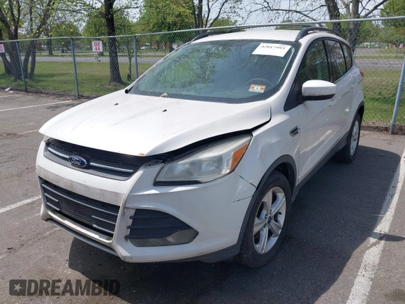 2013 Ford Escape SE with VIN 1FMCU9GXXDUD63179, listed as a IAAI auction lot 42017993 with 72,410 mi miles. Bid and sale history available at carsss.com. Image 2.