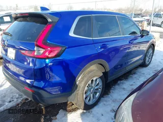 2025 Honda CR-V EX with VIN 5J6RS4H40SL010944, listed as a IAAI auction lot 41230238 with 1,408 mi miles and . Bid and sale history available at DreamBid. Image 4.