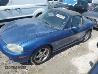 1999 Mazda MX-5 Miata with VIN JM1NB353XX0134898, listed as a Copart auction lot 63429475 with 140,595 mi miles and Clean title. Bid and sale history available at DreamBid. Image 1.