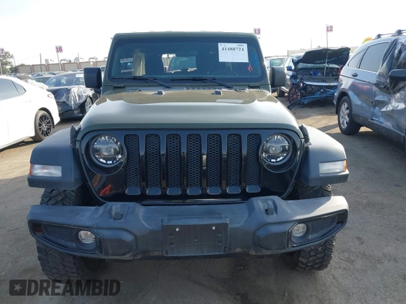 2022 Jeep Wrangler Unlimited High Tide with VIN 1C4HJXDG5NW113205, listed as a IAAI auction lot 41488724 with 30,446 mi miles and . Bid and sale history available at DreamBid. Image 13.