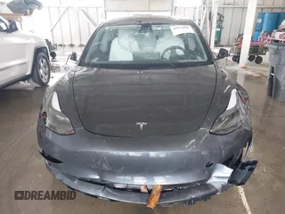 2023 Tesla Model 3 z VIN 5YJ3E1EA2PF591661, wystawiony jako IAAI lot #42014086 z przebiegiem 13 945 mil mil oraz . Historia ofert i sprzedaży dostępna na DreamBid. Obrazek 12.