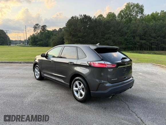 2020 Ford Edge SE с VIN 2FMPK3G9XLBB11099, выставлен на аукционе Copart как лот 66417805 с пробегом 119 223 миль миль и Чистый • Clean title. История ставок и продаж доступна на DreamBid. Изображение 3.