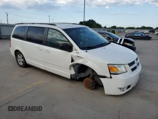 2010 Dodge Grand Caravan SE with VIN 2D4RN4DE9AR237795, listed as a Copart auction lot 55561025 with 212,109 mi miles and Clean Title. Bid and sale history available at DreamBid. Image 4.