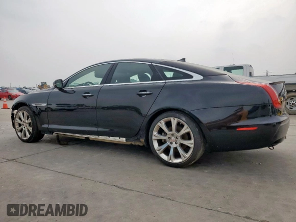 2015 Jaguar XJ with VIN SAJWA1CZ8F8V85381, listed as a Copart auction lot 57464225 with 161,938 mi miles and Salvage Title. Bid and sale history available at DreamBid. Image 2.
