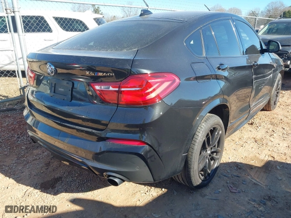 2017 BMW X4 M40i with VIN 5UXXW7C54H0U25941, listed as a IAAI auction lot 41366060 with 68,784 mi miles. Bid and sale history available at carsss.com. Image 4.
