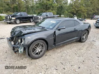 2013 Chevrolet Camaro LS z VIN 2G1FA1E3XD9187283, wystawiony jako Copart lot #53967945 z przebiegiem 146 681 mil mil oraz Czysty tytuł • Clean title. Historia ofert i sprzedaży dostępna na DreamBid. Obrazek 1.