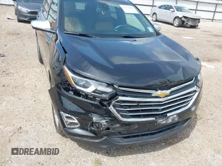 2021 Chevrolet Equinox Premier with VIN 2GNAXNEV5M6151910, listed as a IAAI auction lot 42110010 with 45,911 mi miles and . Bid and sale history available at DreamBid. Image 6.