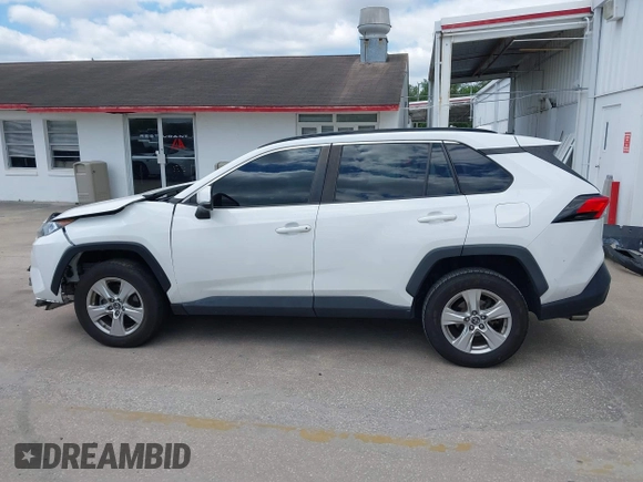 2019 Toyota RAV4 XLE with VIN 2T3W1RFVXKW033696, listed as a IAAI auction lot 42044151 with 126,872 mi miles and . Bid and sale history available at DreamBid. Image 15.