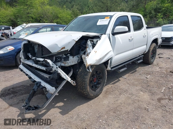 2021 Toyota Tacoma 4WD SR with VIN 3TMCZ5AN2MM414975, listed as a IAAI auction lot 41997227 with 57,729 mi miles. Bid and sale history available at carsss.com. Image 17.