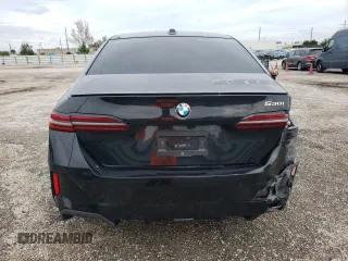 2024 BMW 5 Series 530i with VIN WBA43FJ00RCP78785, listed as a Copart auction lot 74415334 with 3,987 mi miles and Salvage Title. Bid and sale history available at carsss.com. Image 6.