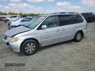 2001 Honda Odyssey EX with VIN 2HKRL18641H550710, listed as a Copart auction lot 54728385 with Not provided miles and Salvage title. Bid and sale history available at DreamBid. Image 1.