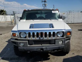 2005 Hummer H2 SUV with VIN 5GRGN23U35H132428, listed as a Copart auction lot 74594554 with 107,701 mi miles and Salvage Title. Bid and sale history available at carsss.com. Image 5.