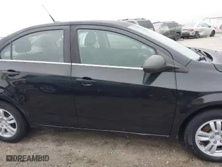 2013 Chevrolet Sonic LT with VIN 1G1JC5SB2D4246093, listed as a IAAI auction lot 41504226 with 132,272 mi miles. Bid and sale history available at carsss.com. Image 13.