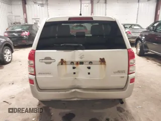 2012 Suzuki Grand Vitara Premium z VIN JS3TD0D62C4100440, wystawiony jako IAAI lot #41711815 z przebiegiem 171 527 mil mil oraz . Historia ofert i sprzedaży dostępna na DreamBid. Obrazek 16.