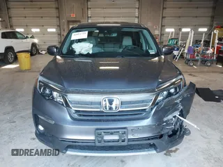 2019 Honda Pilot EX-L with VIN 5FNYF6H50KB035548, listed as a IAAI auction lot 42011724 with 105,195 mi miles and . Bid and sale history available at DreamBid. Image 12.