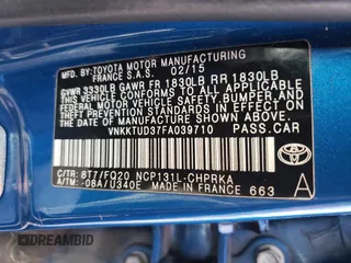 2015 Toyota Yaris L z VIN VNKKTUD37FA039710, wystawiony jako Copart lot #53403255 z przebiegiem 261 266 mil mil oraz Szkoda całkowita • Salvage title. Historia ofert i sprzedaży dostępna na DreamBid. Obrazek 12.