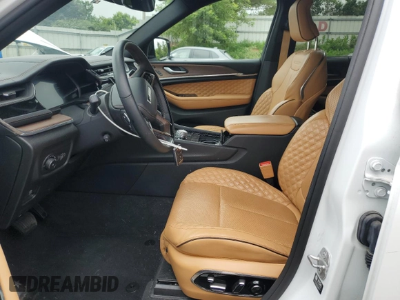 2022 Jeep Grand Cherokee Summit Reserve with VIN 1C4RJHEG6N8610843, listed as a Copart auction lot 63500415 with 77,436 mi miles and Clean title. Bid and sale history available at DreamBid. Image 7.