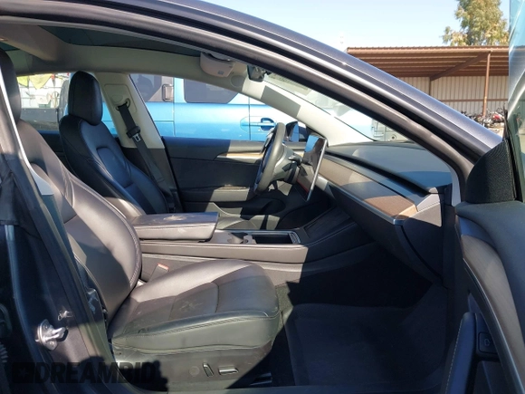2023 Tesla Model 3 with VIN 5YJ3E1EA7PF447409, listed as a IAAI auction lot 41965416 with 40,033 mi miles and . Bid and sale history available at DreamBid. Image 5.