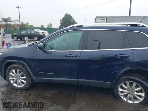 2014 Jeep Cherokee Limited with VIN 1C4PJMDS0EW277301, listed as a IAAI auction lot 42357034 with 61,825 mi miles and . Bid and sale history available at DreamBid. Image 14.