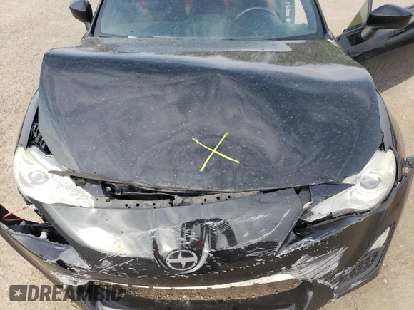 2014 Scion FR-S z VIN JF1ZNAA19E9709220, wystawiony jako Copart lot #54389725 z przebiegiem 123 443 mil mil oraz Szkoda całkowita • Salvage title. Historia ofert i sprzedaży dostępna na DreamBid. Obrazek 11.