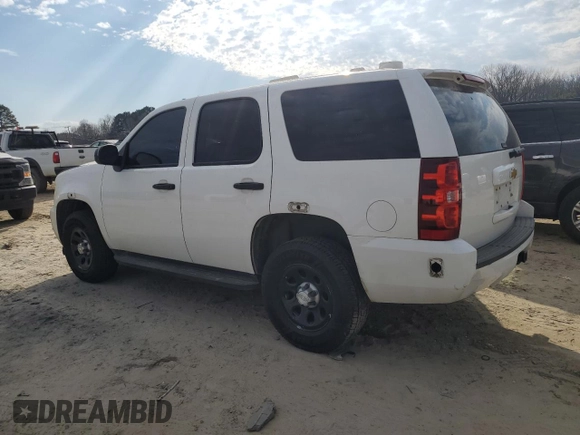 2014 Chevrolet Tahoe Commercial with VIN 1GNSK2E01ER165329, listed as a Copart auction lot 45497085 with 151,005 mi miles and Salvage title. Bid and sale history available at DreamBid. Image 2.