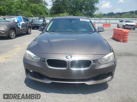 2014 BMW 3 Series 328i xDrive with VIN WBA3B5C5XEP542908, listed as a Copart auction lot 62636965 with 141,520 mi miles and Clean title. Bid and sale history available at DreamBid. Image 5.