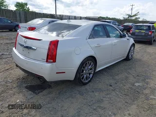 2013 Cadillac CTS Premium z VIN 1G6DS5E3XD0106332, wystawiony jako IAAI lot #42152577 z przebiegiem 114 700 mil mil oraz . Historia ofert i sprzedaży dostępna na DreamBid. Obrazek 4.